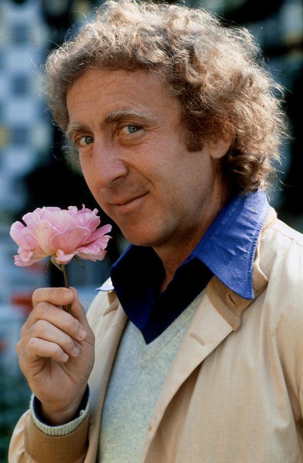 Gene Wilder Gene Wilder died holding hands with family and listening to