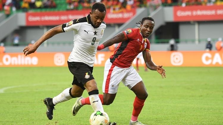 Geoffrey Kizito Jordan Ayew of Ghana Geoffrey Kizito of Uganda Goalcom