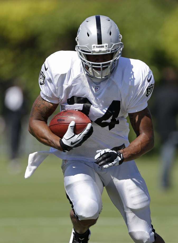 George Atkinson III Former safety George Atkinson cheers for son at Raiders