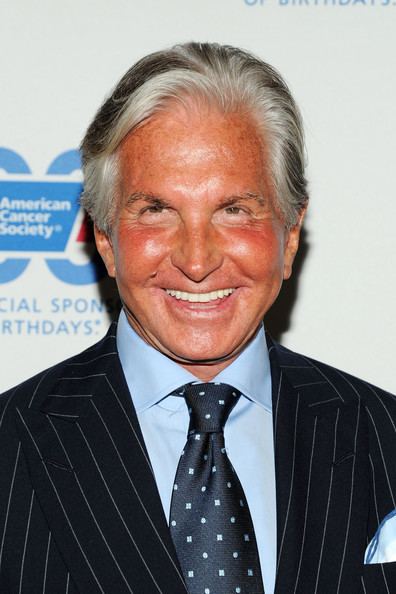 Actor George Hamilton and his wife Kimberly Blackford appear on
