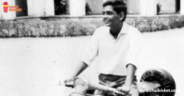 George Reddy wearing white long sleeves while riding a motorcycle