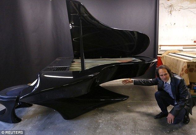 Gergely Bogányi Gergely Boganyi designs futuristic Batpiano made of carbon fibre