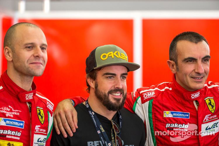 Gianmaria Bruni Gianmaria Bruni and Andrea Bertolini with Fernando Alonso
