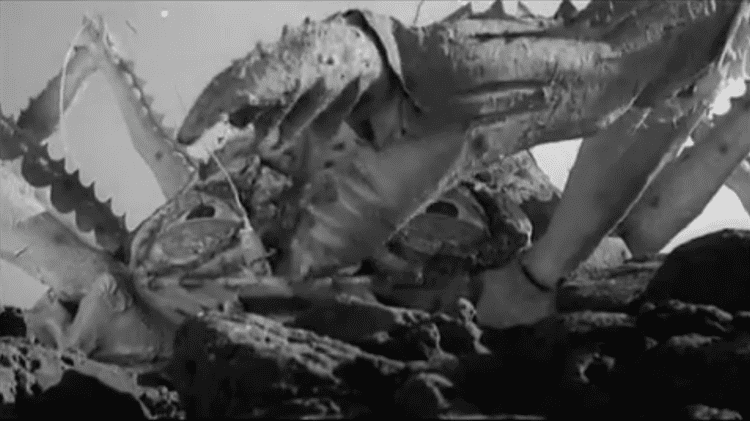 Giantland movie scenes Again a great moment for me is when Martha and Dale are besieged by a crab monster who breaks through the ceiling in the room where the radio is 