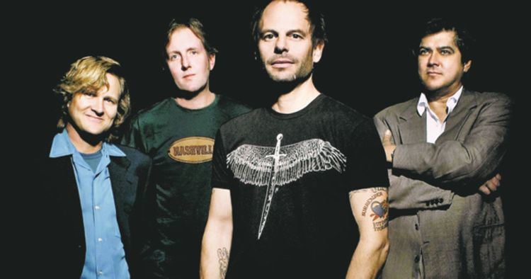 Gin Blossoms Gin Blossoms are cutting their new album with the REM production