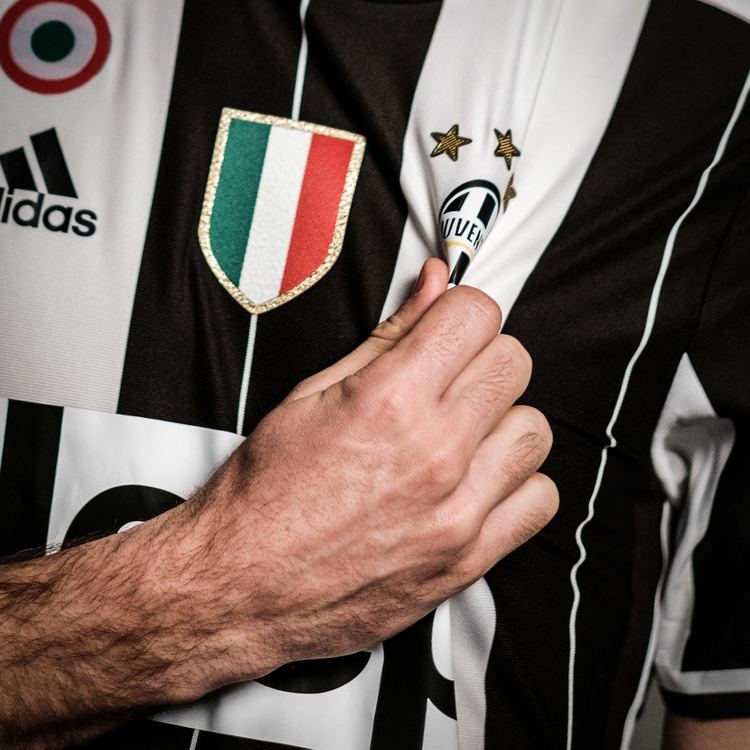 Giorgio Chiellini holding his football jersey