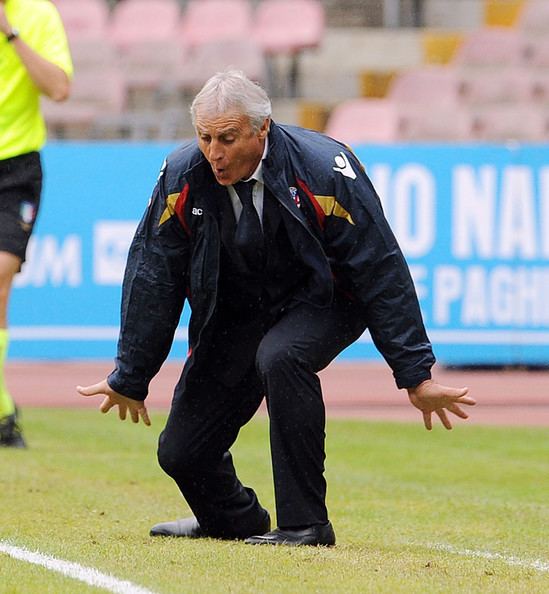 Palermo's new coach Giuseppe Papadopulo wears a soccer scarf during his  presentation in the Palermo soccer team headquarters Monday, Jan. 30, 2006.  Papadopulo was hired to replace Luigi Del Neri as coach