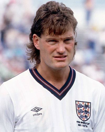 Glenn Hoddle in fierce look wearing his football jersey