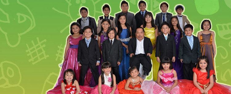 Casts of Goin' Bulilit wearing suits and gowns.
