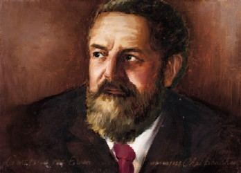 Portrait of Gottfried von Einem with mustache and beard while wearing a black coat, white long sleeves, and maroon necktie