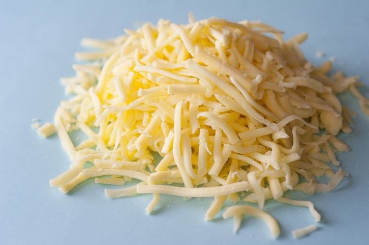 Grated cheese Grated cheddar cheese Free Stock Image