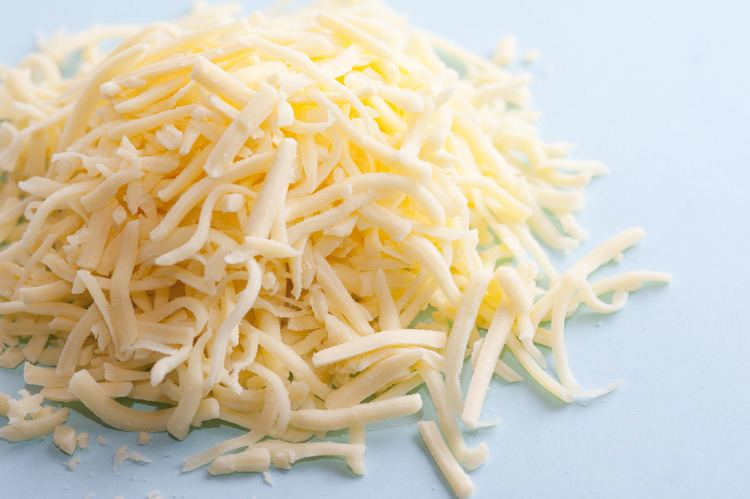 Grated cheese Pile of grated cheese7997 Stockarch Free Stock Photos