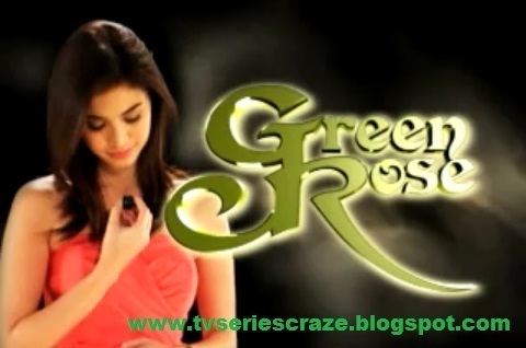 Anne Curtis looking and holding her necklace while wearing an orange top in the 2011 Philippine television drama series, Green Rose