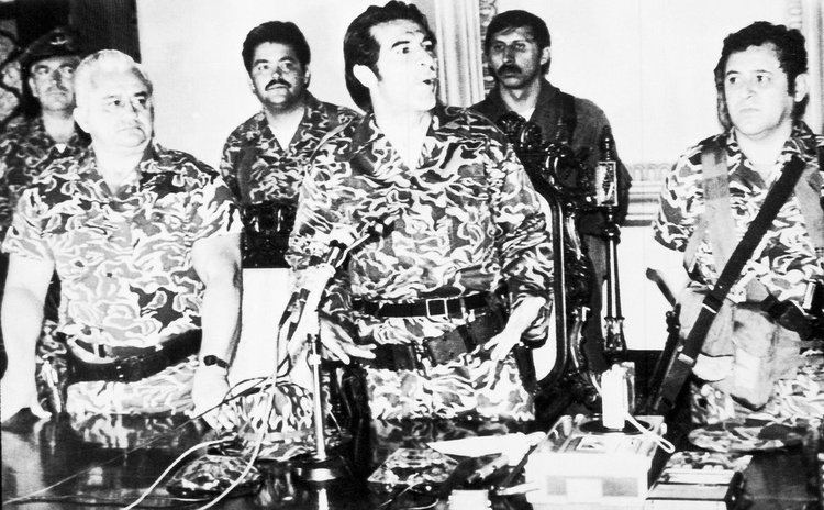 Gen. Efrain Rios Montt, center, announcing the formation of a junta in 1982