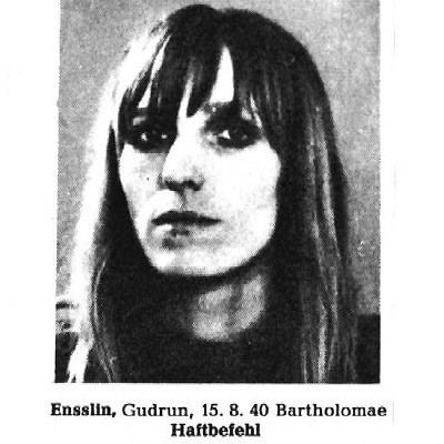 Gudrun Ensslin with a serious face and with bangs.