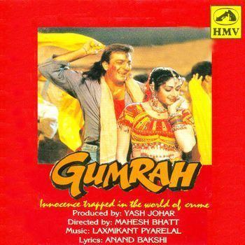 Sanjay Dutt smiling with Sridevi in the movie poster of the 1993 Indian Hindi action drama and crime thriller, Gumrah