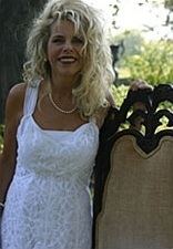 Gwen Shamblin wearing white dress and necklace