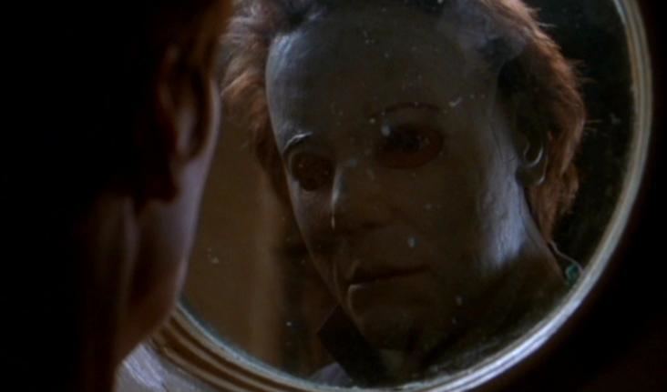 Halloween H20: 20 Years Later movie scenes HOW IS HIS MASK NOT DIRTY Also in this one they gave his mask an even dumber haircut He looked like he should have been a VJ on MTV in the late 