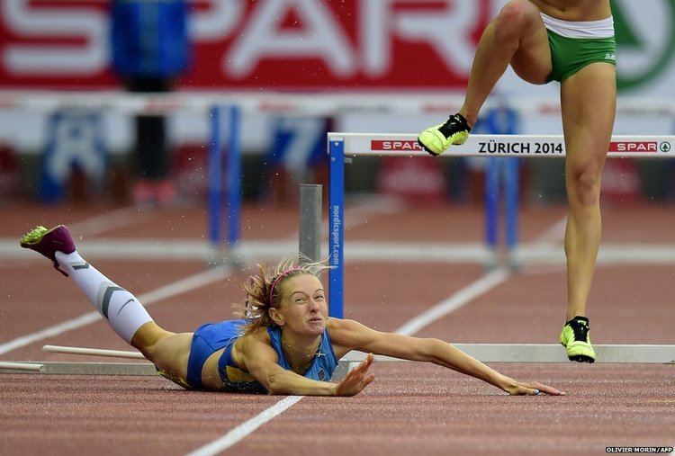 Hanna Ryzhykova Athlete Hanna Ryzhykova of the Ukraine lands a belly flop after