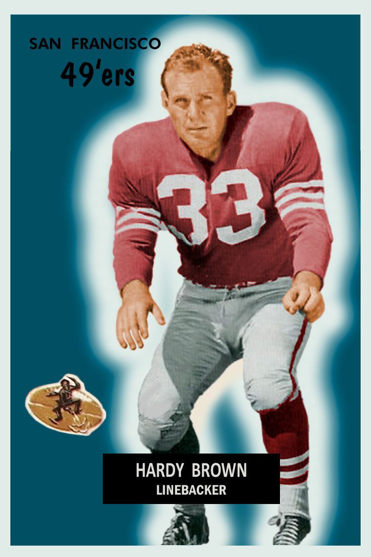 Hardy Brown on a defensive position and wearing a red football jersey numbered 33 and white and red-striped pants on a poster