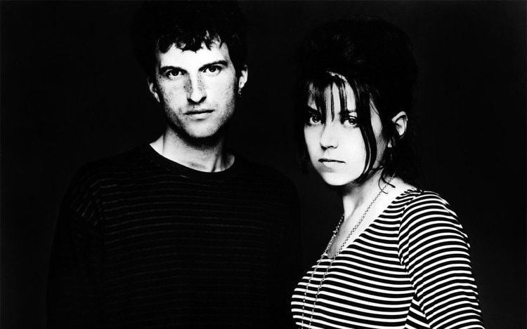 David Gavurin wearing a t-shirt while Harriet Wheeler wearing a striped blouse and necklace