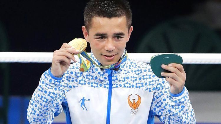Hasanboy Dusmatov Olympic gold medalist Hasanboy Dusmatov of Uzbekistan signs
