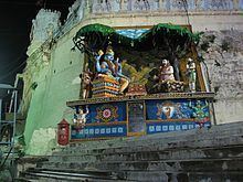 Devotee Hathiram Bhavaji playing dice with Lord Balaji.