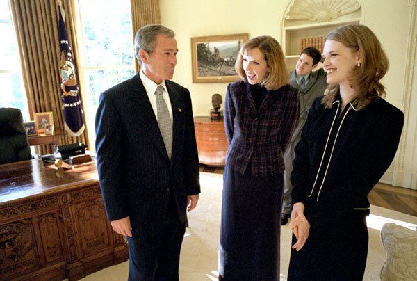 Heather Mercer President George W Bush talks with Dayna Curry center and Heather