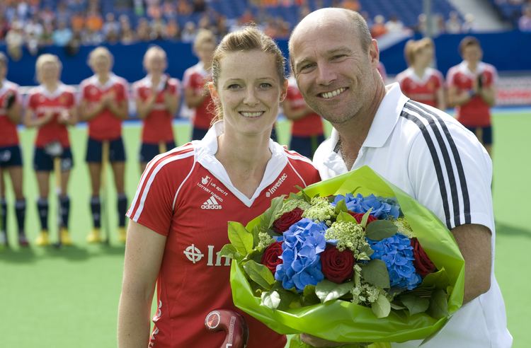 Helen Richardson-Walsh Helen Richardson Walsh receives a bouquet of flowers for her 150th England cap from Performance Director Danny Kerry Eng v Germany EuroHockeyjpg