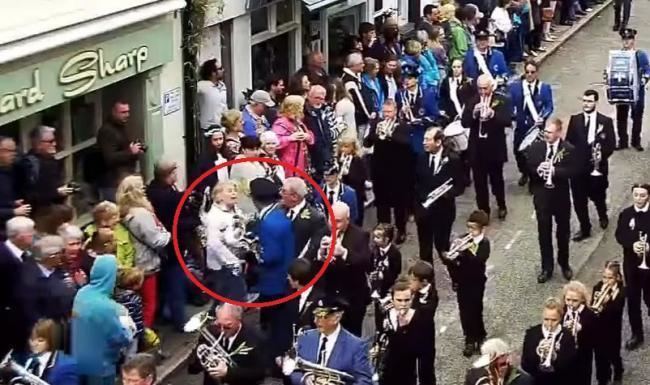 Helston Town Band Angry woman caught on camera trying to barge Helston Town Band out