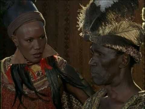 Grace Jones looking at Henry Cele in a scene from the 2001 tv movie Shaka Zulu