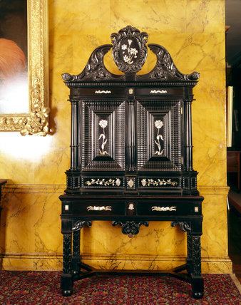 Herman Doomer A cabinet and stand in ebony with mother of pearl inlay attributed