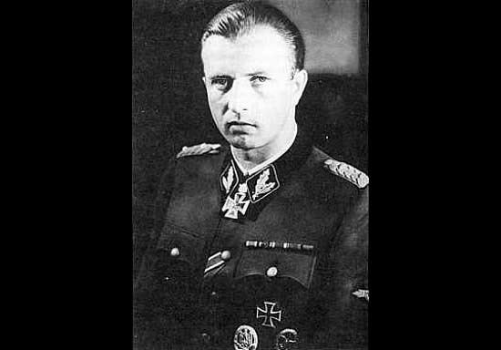 Hermann Fegelein's serious face while wearing long sleeves with a badges