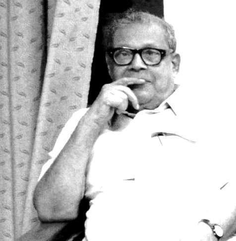Himanish Goswami in black and white wearing an eyeglasses