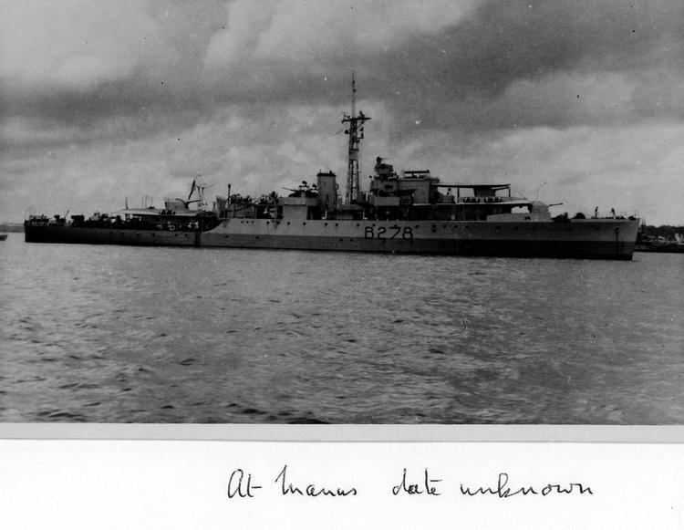 HMS Whimbrel (U29) featured in a postcard during the second world war docked in a port.