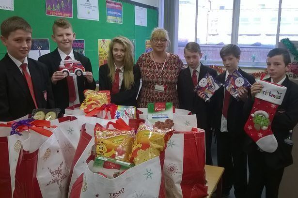 Holywell High School Holywell High School students donate hampers to former homeless