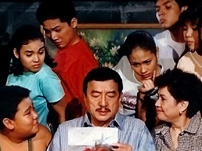 Dolphy, Nova Villa, Smokey Manaloto, Claudine Barretto, Maybelyn de la Cruz, Vandolph Quizon in a scene from the 1992 comedy series Home Along Da Riles