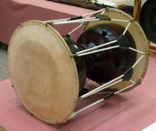 Hourglass drum