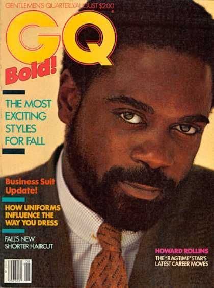 Howard Rollins on a cover of GQ Magazine wearing brown coat, checkered long sleeves and neck tie