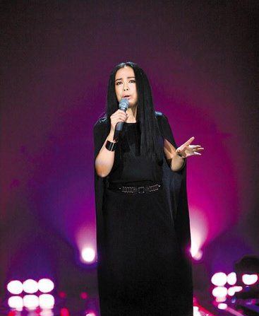 Huang Qishan Veteran Singer Rises to Fame All China Womens Federation