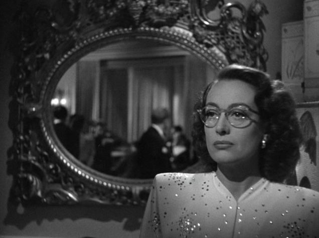 Humoresque (film) movie scenes In Humoresque she plays a rich socialite Helen Wright who fancies herself a patron of unknown artists and keeps a group of attractive sycophantic young 