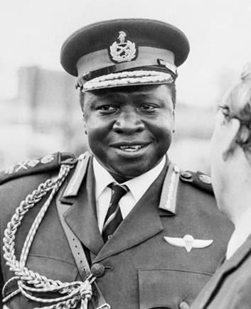 Idi Amin smiling while wearing a military uniform