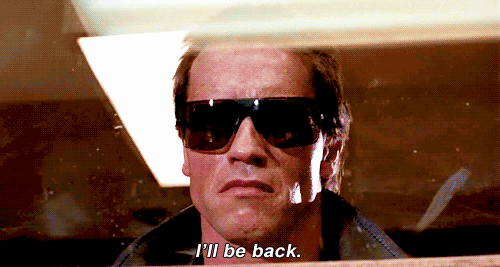 Arnold Schwarzenegger saying the words "I'll be back" while wearing black shades and a black jacket