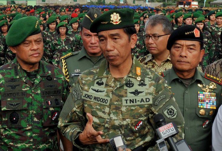 Indonesian National Armed Forces Indonesia39s military reenters civilian affairs after president