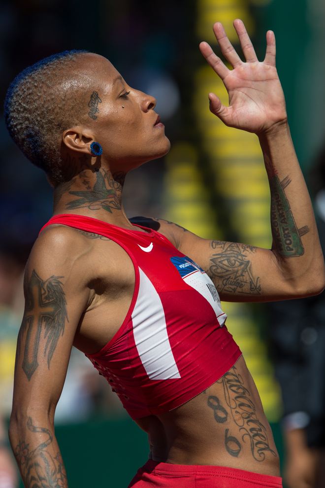 Inika McPherson what a feeling Lesbian Olympians Inika McPherson High Jump