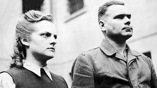 Irma Grese with another Nazi concentration camp officer with both of them wearing their officer uniforms.