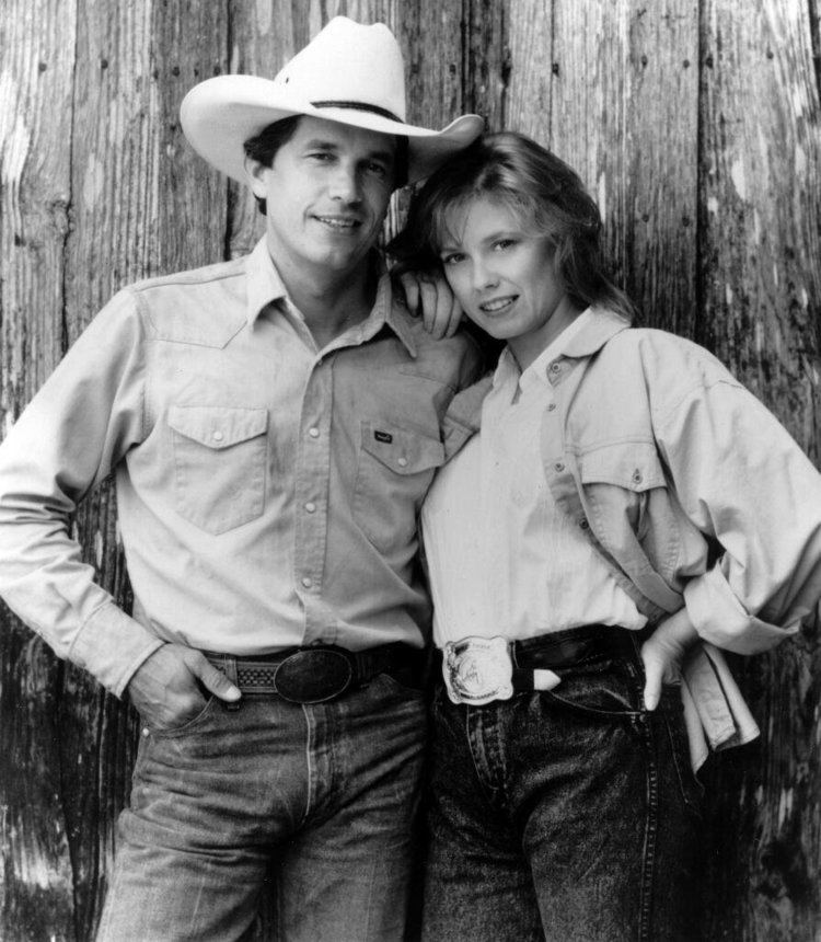 Isabel Glasser and George Strait in their denim outfit, a scene from Pure Country (1992 Film)
