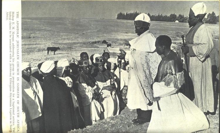 Bishop E. M. Morupa addressing his group in preparation for a baptismal service