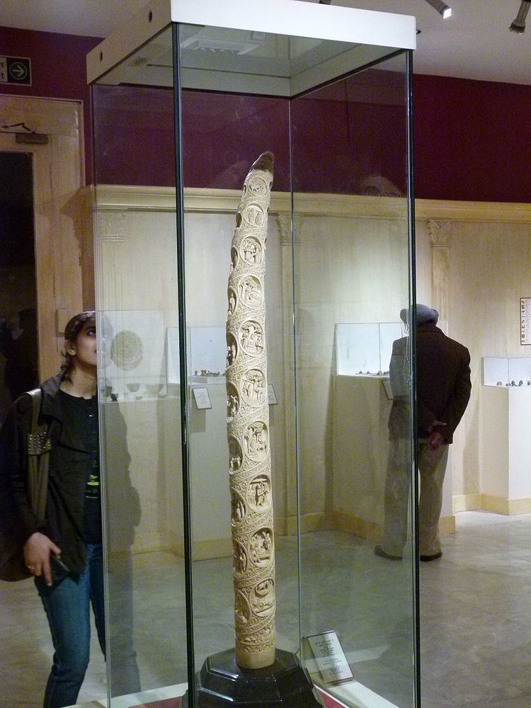 Ivory carved tusk depicting Buddha life stories