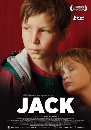 The movie poster of Jack (2014 film),  on the left is Ivo Pietzcker is serious, looking to his right, has brown hair wearing a shirt under a green winter shirt and a red hoodie jacket, at the right Georg Arms is sleeping, laying on Ivo Pietzcker left chest, has blonde hair, below is the title “JACK” at the top right is the movie award written “PREMIOS DEL CINE ALEMAN BUNDESFILMPREIS DEPLATA” with a laurel wreath on both side, and a white silhouette of bear standing with number 64’ Competition written.